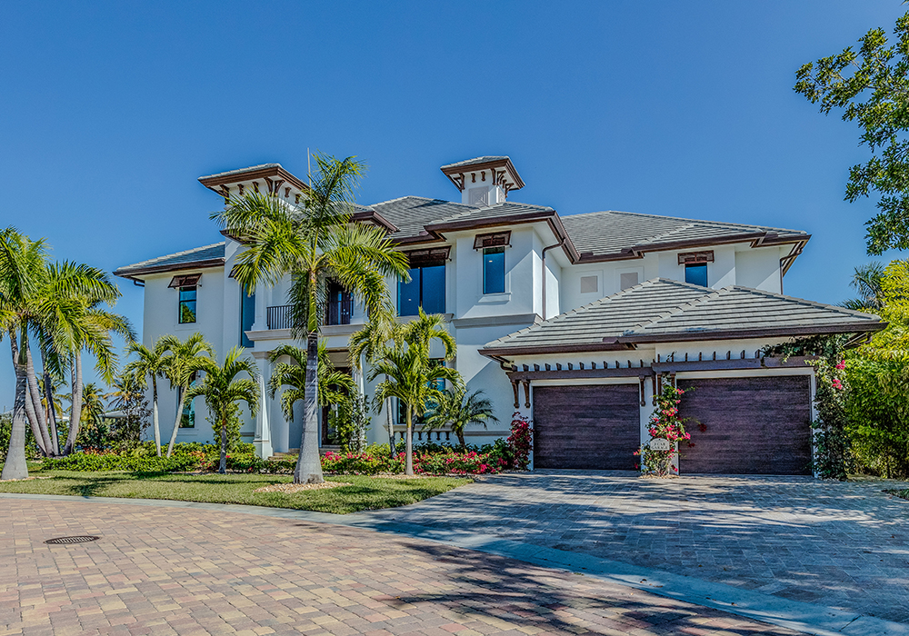 Beautiful home exterior with palm trees